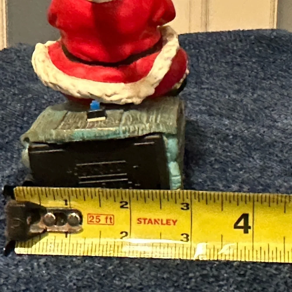 Musical vibrating Santa on his sleigh. Plays 3 songs!